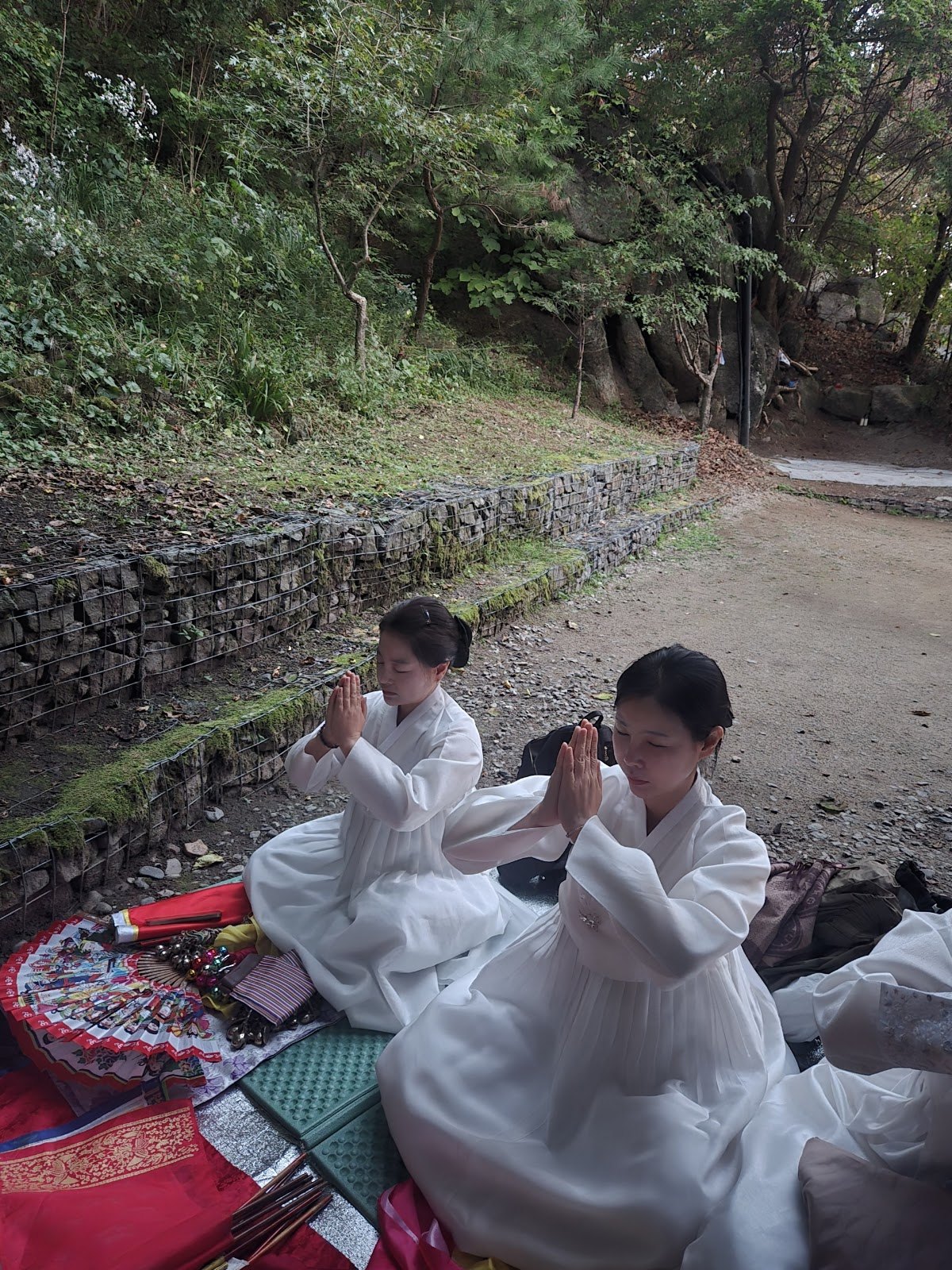 Oct 3, prayer at Mt. Gamaksan Sosul Yonggung prayer site, praying with her spirit daughters