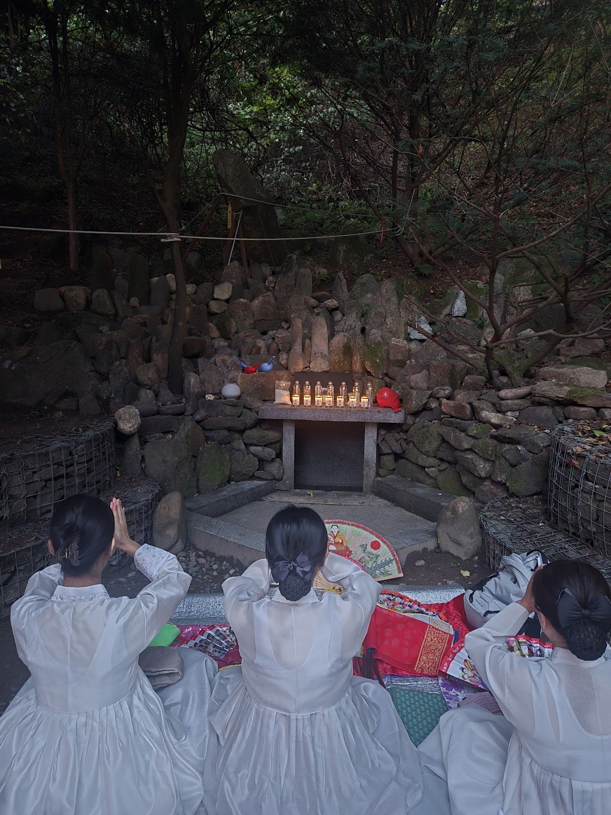 Oct 3, prayer at Mt. Gamaksan Sosul Yonggung prayer site, praying with her spirit daughters