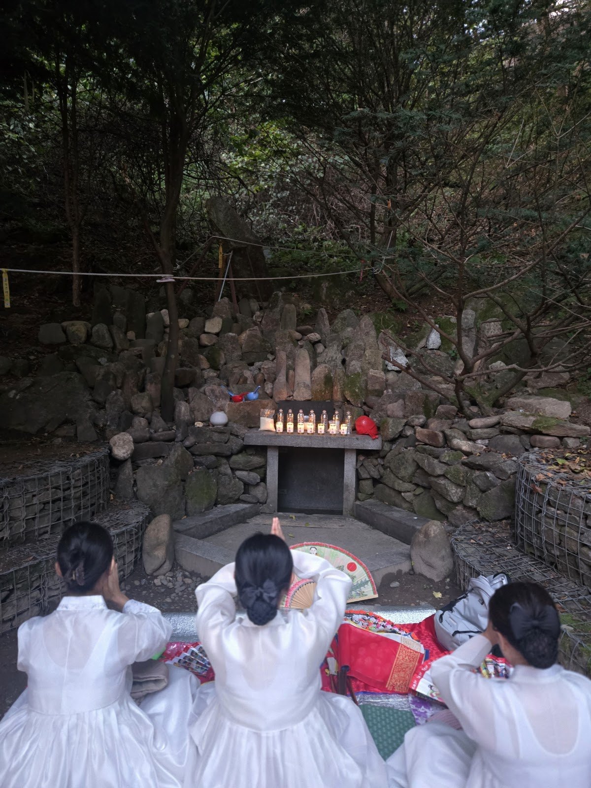 Oct 3, prayer at Mt. Gamaksan Sosul Yonggung prayer site, praying with her spirit daughters